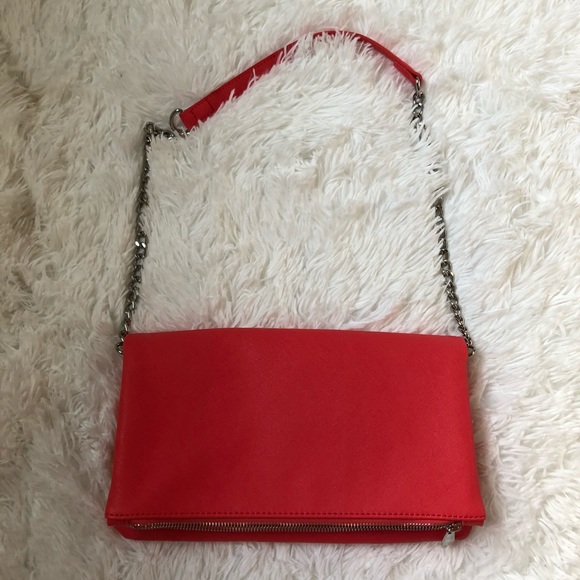 Express Handbags - Express fold over clutch in bright coral